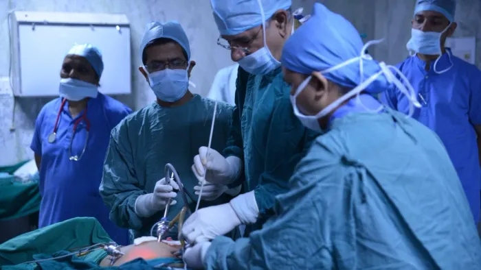 Surgeons at work in Global Hospital, Mount Abu