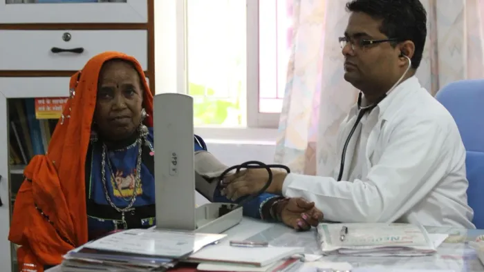 A doctor attending a patient at Global Hospital, Mount Abu