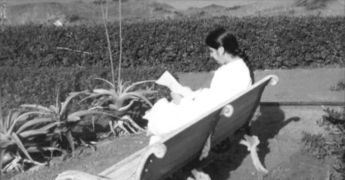 Mamma reading Godly versions.jpg